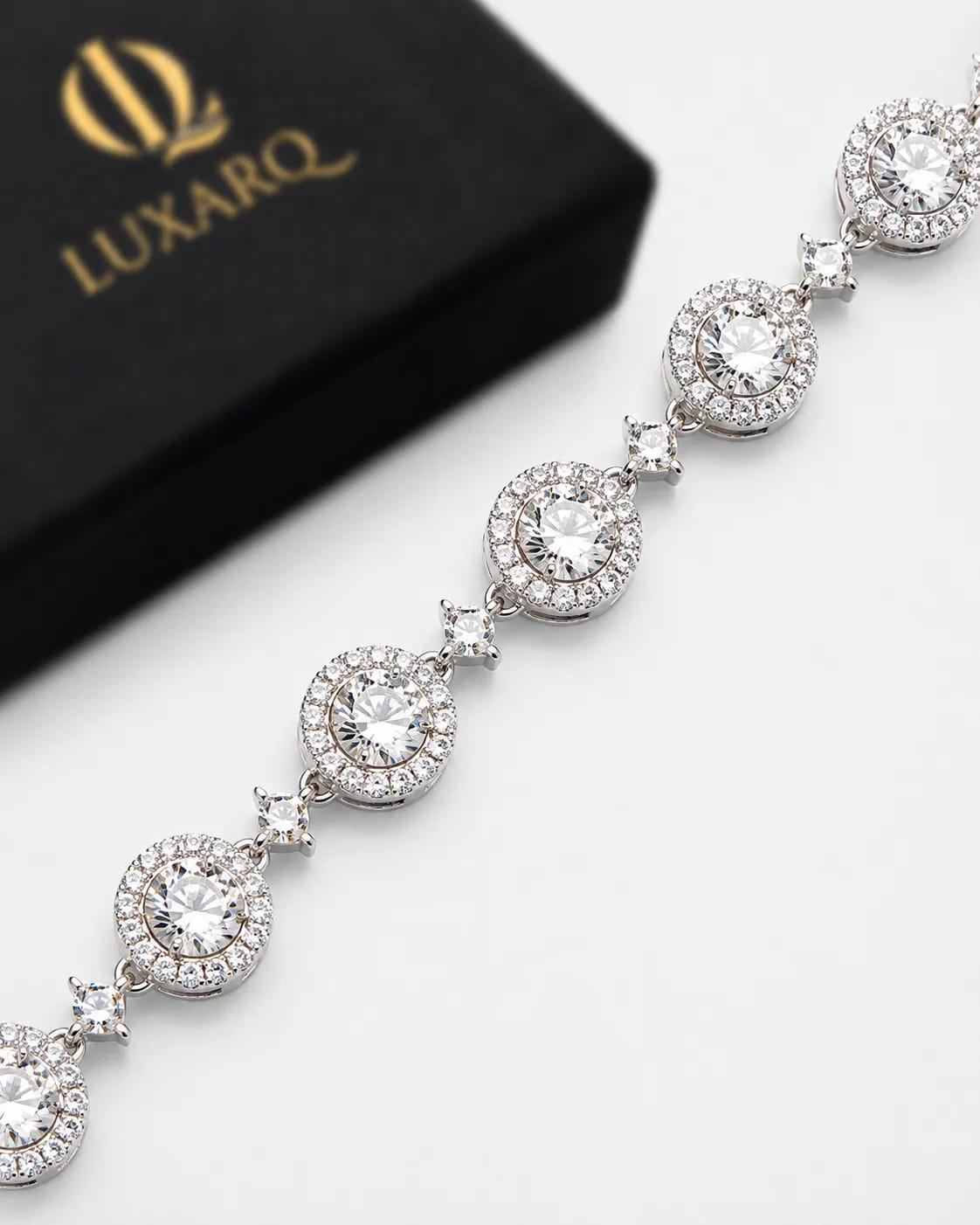 LUXARQ Oval Halo CZ Rhodium Plated Tennis Bracelet